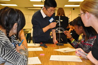 Peter Huang teaches students at Mira Loma Middle School how a solar cell works.